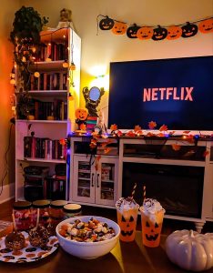A cozy Halloween decorated home with snacks & Netflix.