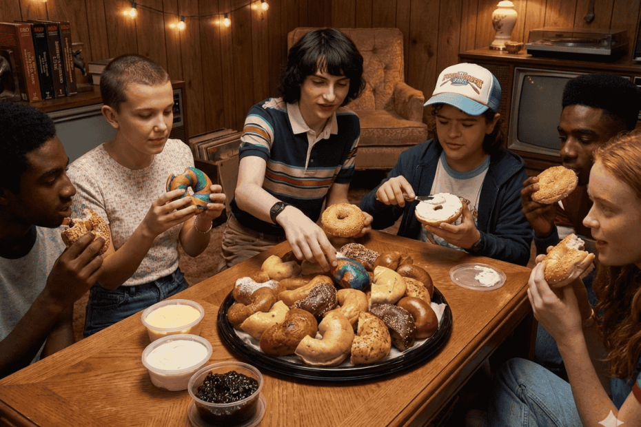 Stranger Things crew feasting on the Fast Bagel platter